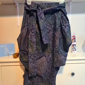 NY&Co. Over the Knee Pencil length skirt with a draped design.